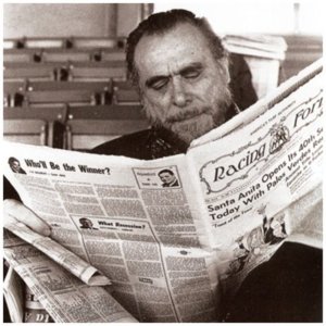 Buk reading a newspaper.jpg