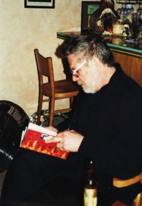 Montfort looking at Fante bio at Havana on Sunset in LA1.JPG